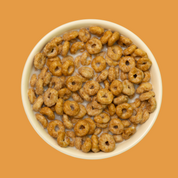 Bol de céréales Magic Morning goût Peanut Butter, trempées dans du lait, riches en protéines et faibles en sucre.